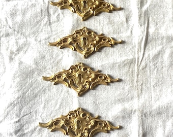 Set of four matching Antique Brass Keyhole Cover Escutcheon made in France in the 1900s elegant pieces