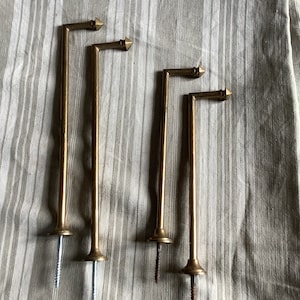 Two pairs of different sized 1920s Classical Vintage Brass Curtain Tiebacks made in France