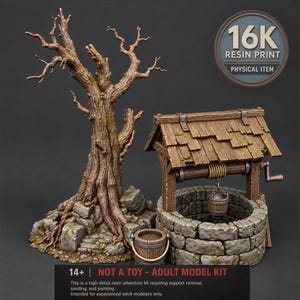 May include: A 16K resin print model kit featuring a gnarled, leafless brown tree set among grey stones and a rustic stone well with a wooden roof, a rope-operated bucket, and a separate wooden bucket. Text reads 16K RESIN PRINT and 14+ NOT A TOY.