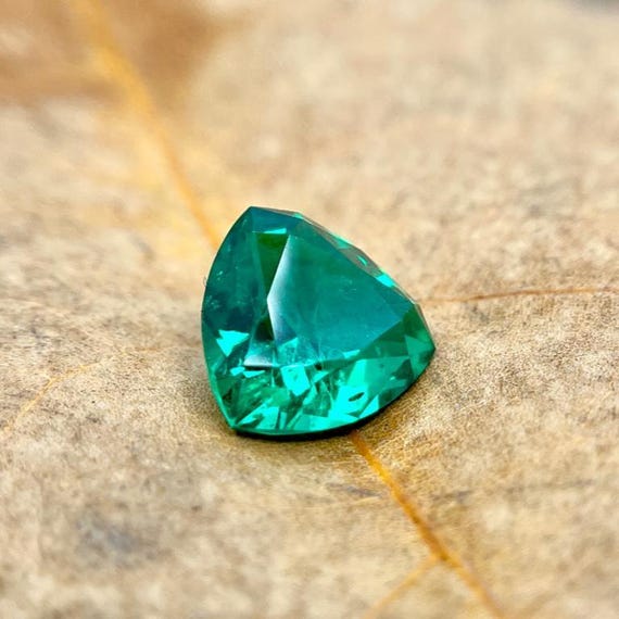 Colombian Emerald Trillion Cut. Hydrothermal Lab Grown Gemstone.