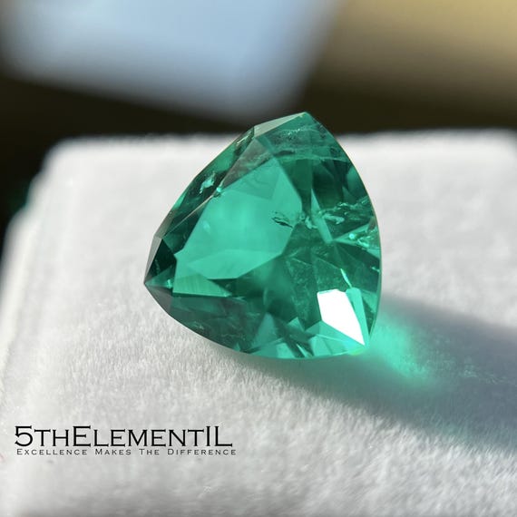 Colombian Emerald Trillion Cut. Hydrothermal Lab Grown Gemstone.