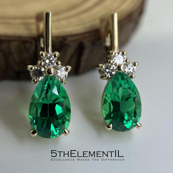 14K Gold Lab Grown Emerald Earrings With Diamonds.