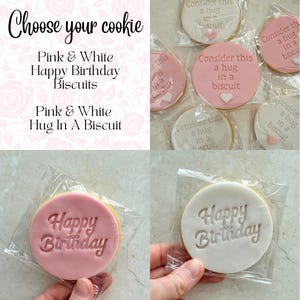 May include: Round biscuits in clear plastic packaging. Some feature pink or white icing with the embossed text 'Happy Birthday'. Others feature pink or white icing with the embossed text 'Consider this a hug in a biscuit' and a small heart shape.