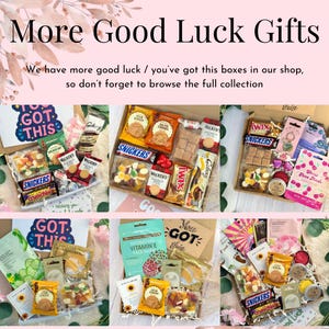 May include: An assortment of gift boxes filled with snacks, candies, and skincare products. The boxes include Snickers, Twix, and Walker's cookies. The text "More Good Luck Gifts" is at the top.