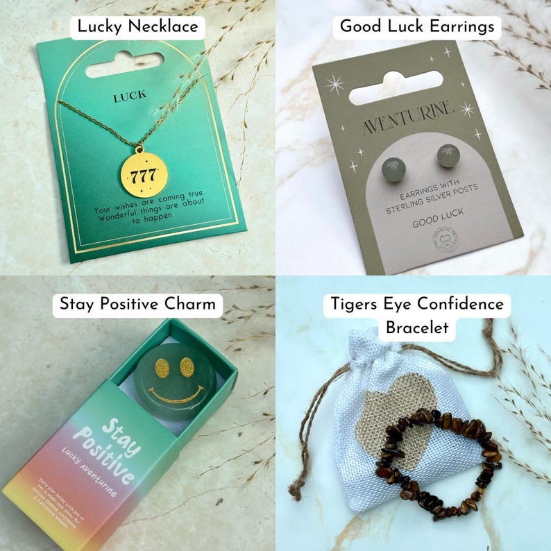 May include: A collection of jewelry items, including a gold-colored necklace with a '777' pendant, stud earrings, a smiley face charm, and a tiger's eye bracelet. Each item is packaged with descriptive text.