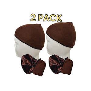 May include: Two brown wig caps and satin bonnets are displayed on mannequin heads. The text "2 PACK" is in yellow letters. The wig caps are a dark brown colour with a quilted design. The satin bonnets are a darker brown colour.