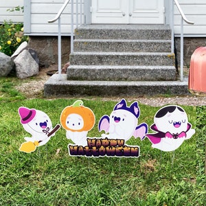 May include: Four Halloween yard signs featuring cartoon ghosts, a pumpkin, and a bat. One ghost holds a broom, another is inside a pumpkin, and a third has bat wings. The signs spell out "Happy Halloween".