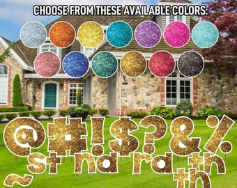 May include: Gold glitter yard signs with the letters @ # ! $ ? & % and the words "Stina rain". The signs are displayed on a green lawn in front of a house. The image also shows a selection of 10 different glitter colors.