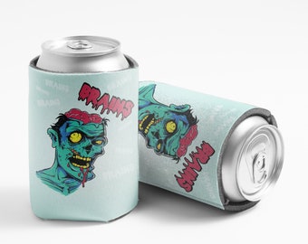 May include: Two light blue can coolers with a zombie graphic. One cooler is upright with a can inside, the other is lying down. The zombie has green skin, red brains, and the word "BRAINS" in red.