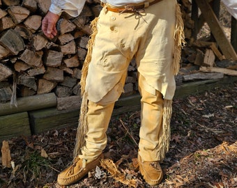 Rare one-of-a-kind handmade authentic buckskin pants with fringe, antler details, and pockets.