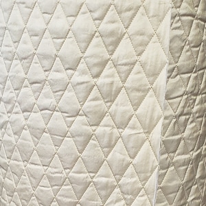 Diamond Quilted gold silk fabric yardage perfect for home decor, upholstery, apparel, tableware, wedding decor, drapery, etc...