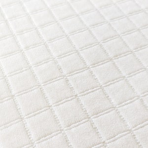 Modern woven geometric Soft Creamy White fabric perfect for bedding, upholstery, drapery, tableware, crafts, stockings, pillows, etc