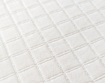 Modern woven geometric Soft Creamy White fabric perfect for bedding, upholstery, drapery, tableware, crafts, stockings, pillows, etc