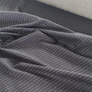 Handsome cotton pinstripe fabric in charcoal gray or black, Perfect for apparel, upholstery, drapery, bedding, tableware, party decor, etc..