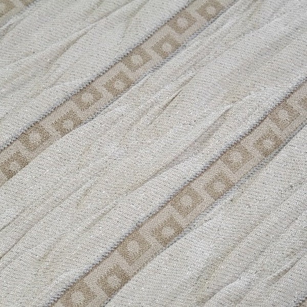 Gorgeous crimped neutral fabric with a hint of sparkle & geometric design perfect for upholstery, home decor, bedding, crafts, drapery, etc.
