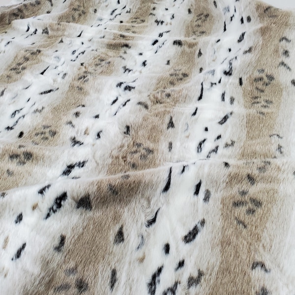 Thick animal faux fur in tan, ivory, black, Perfect for home decor, bedding, apparel, crafts, tableware, winter decor, etc...