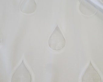 White drapery weight fabric with SHEER droplet cutouts, perfect for overlaying on pillows, bedding, apparel, tableware, crafts, handbags,etc