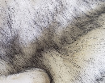 Thick white faux fur with black tips on the ends, Perfect for throws, bed scarves, apparel, pillows, trims, and decor crafts, etc...