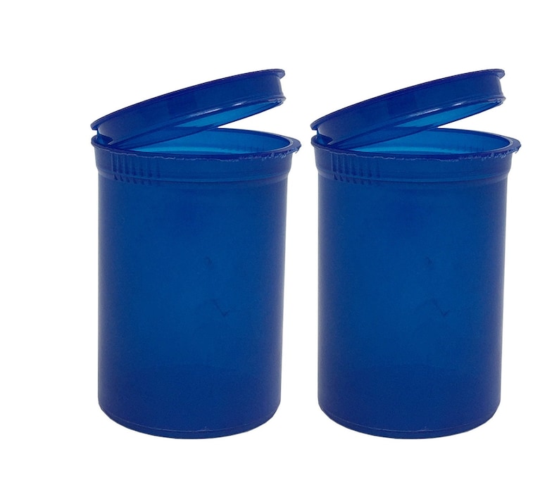 May include: Two blue plastic pill bottles with lids open. The bottles are empty and ready to be filled.