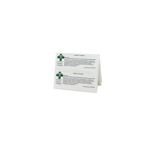 May include: A white card with a green medical cross and the text "Medical Cannabis" printed on it. The card also includes the text "Strain" and a list of options: Indica, Sativa, Hybrid. The card is folded in half.