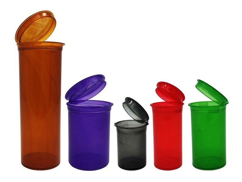 May include: Five plastic pill bottles with lids open. The bottles are in different colors: orange, purple, black, red, and green.