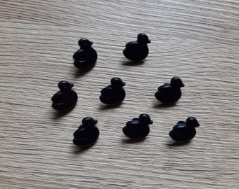8 boutons noirs petits canards