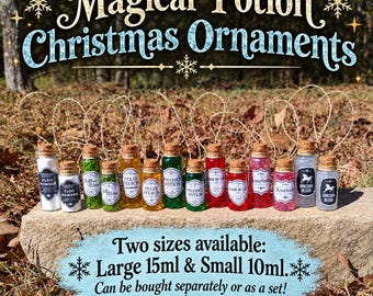 May include: A collection of small glass bottle Christmas ornaments labeled as Magical Potion Christmas Ornaments. The bottles contain various colored liquids and materials, with labels including Floo Powder, Felix Felicis, and Unicorn Blood. Two sizes available: Large 15ml & Small 10ml.