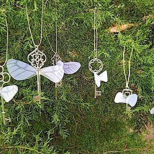 Flying Key Christmas ornaments. These HP Fandom ornaments come in 6 magical varieties.  Available separately or discounted as a set.