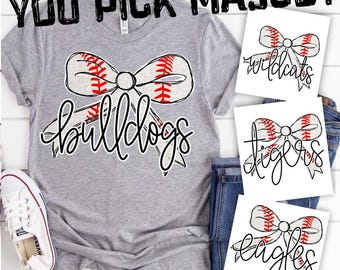 May include: A gray t-shirt with a baseball-themed bow and the word "bulldogs" written in black cursive. Three separate images show the same bow with the words "wildcats", "tigers", and "eagles" written in black cursive.