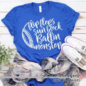 May include: A royal blue t-shirt with a white graphic of a baseball with the text "flip flops sun block ballin nonstop".