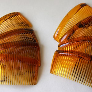 Tortoiseshell hair comb, rounded back  3 3/4"