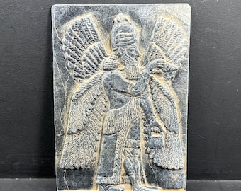 Ancient near eastern mythical tablet tile human with wing