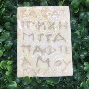 Ancient Greek cuneiform tablet Greek writing