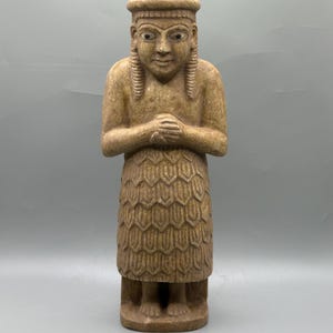 Ancient rare near eastern depicted votive statue of limestone with eyes inlaid motif