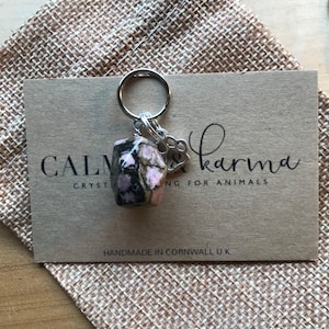 Rhodonite healing crystal charm calms, grounds, heals past trauma good for rescue dog cat, pets, soothes stress, anxiety and fear