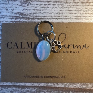 Opalite. Removes energy blockages, aligns chakras, emotional strength,communication, strengthens bonds, Crystal healing charm for cat dogs