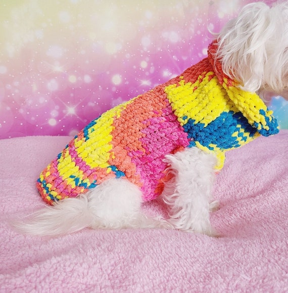 Pink yellow store blue sweater