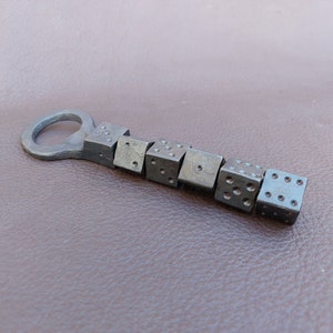 Geschmiedeter Twisted Dice Flaschenöffner