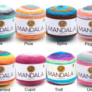 May include: Eight balls of Lion Brand Mandala yarn in various color combinations, including Genie, Pixie, Spinx, Pegasus, Thunderbird, Cupid, Troll, and Unicorn.
