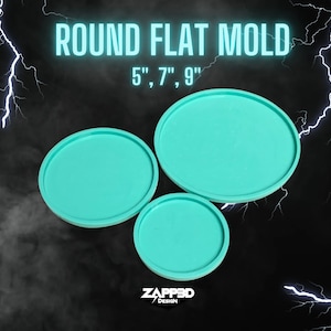 May include: Three round silicone molds for crafting, in teal, with sizes 5", 7", and 9" printed on a black background with lightning bolts.
