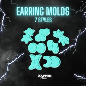 May include: A set of seven turquoise silicone earring molds in various shapes, including stars, hearts, leaves, circles, hexagons, butterflies, and moons. The molds are arranged on a black background with lightning bolts.