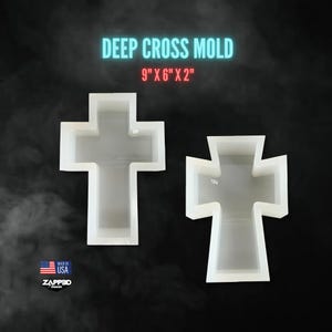 May include: Two white silicone molds for making cross shapes. The molds are 9 inches by 6 inches by 2 inches. The text "DEEP CROSS MOLD" and "9" X 6" X 2" is printed in neon pink on a black background.
