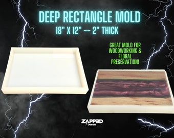 May include: A white rectangular silicone mold for resin casting. The mold is 18 inches by 12 inches and 2 inches deep. The mold is shown with a finished resin project inside. The text "DEEP RECTANGLE MOLD" and "18" X 12" -- 2" THICK" is displayed above the mold. The text "GREAT MOLD FOR WOODWORKING & FLORAL PRESERVATION!" is displayed on the right side of the mold. The text "ZAPPED DESIGN" is displayed below the mold.