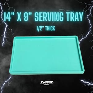 May include: A turquoise serving tray measuring 14 inches by 9 inches and 1/2 inch thick.  The tray is made of silicone and has a smooth surface.