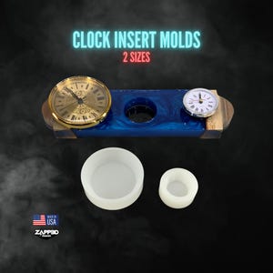 May include: Clock insert molds with two sizes are displayed. The image shows a blue and wood-toned clock base with two clocks and two white molds. The clocks have gold and silver faces. The text "CLOCK INSERT MOLDS" and "2 SIZES" is visible.