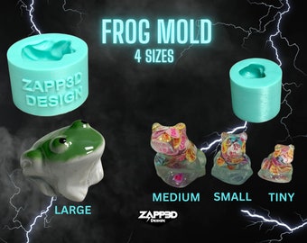 May include: Four silicone molds for making frog figurines. The molds are turquoise blue and show the frog shape in the mold.  The molds are labeled "ZAPP3D DESIGN".  Four finished frog figurines are shown in the image, labeled "LARGE", "MEDIUM", "SMALL", and "TINY".