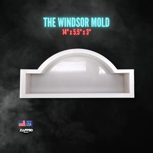 May include: A white Windsor mold with a rectangular base and a central arched top section. The text THE WINDSOR MOLD 14" x 5.5" x 3" is displayed above the object. A small USA flag icon and the text ZAPP3D DESIGN are visible in the corner.