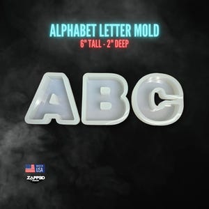 May include: White silicone mold for making resin letters. The mold is shaped like the letters A, B, and C. The mold is 6 inches tall and 2 inches deep. The letters are 6 inches tall and 2 inches deep.