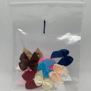 Cute extra bows for small bird Flypers. Pet birds look cute and smart, with these colorful tiny bows to smarten up your bird boutique.