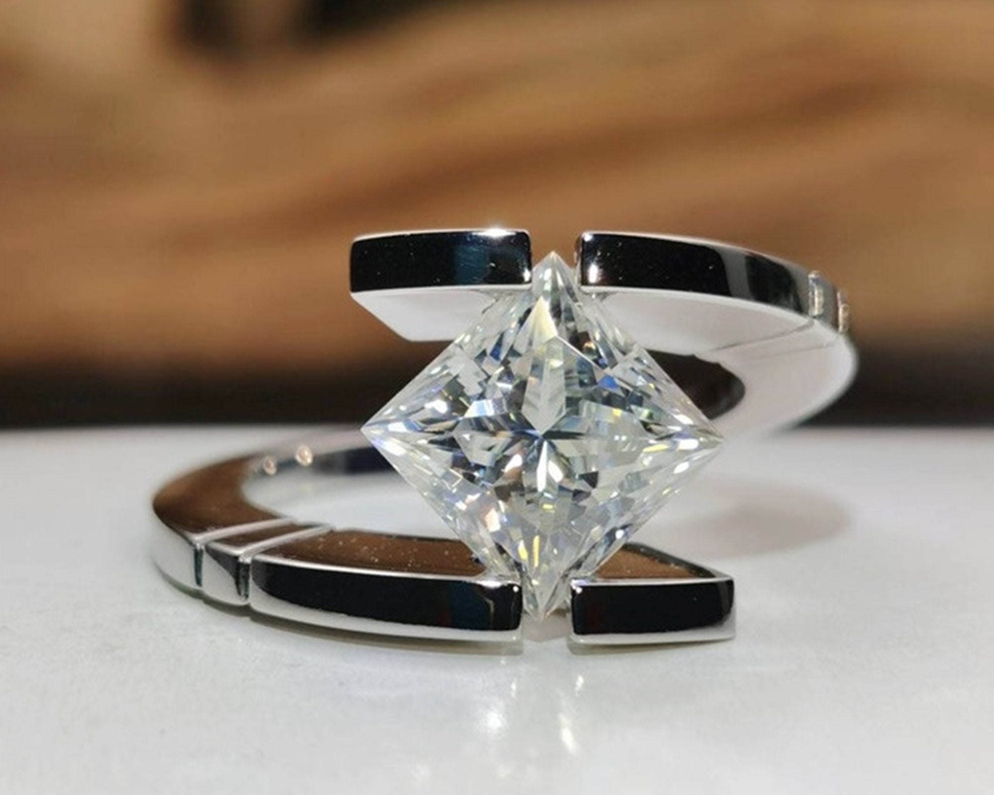 Tension set princess cut diamond ring discount